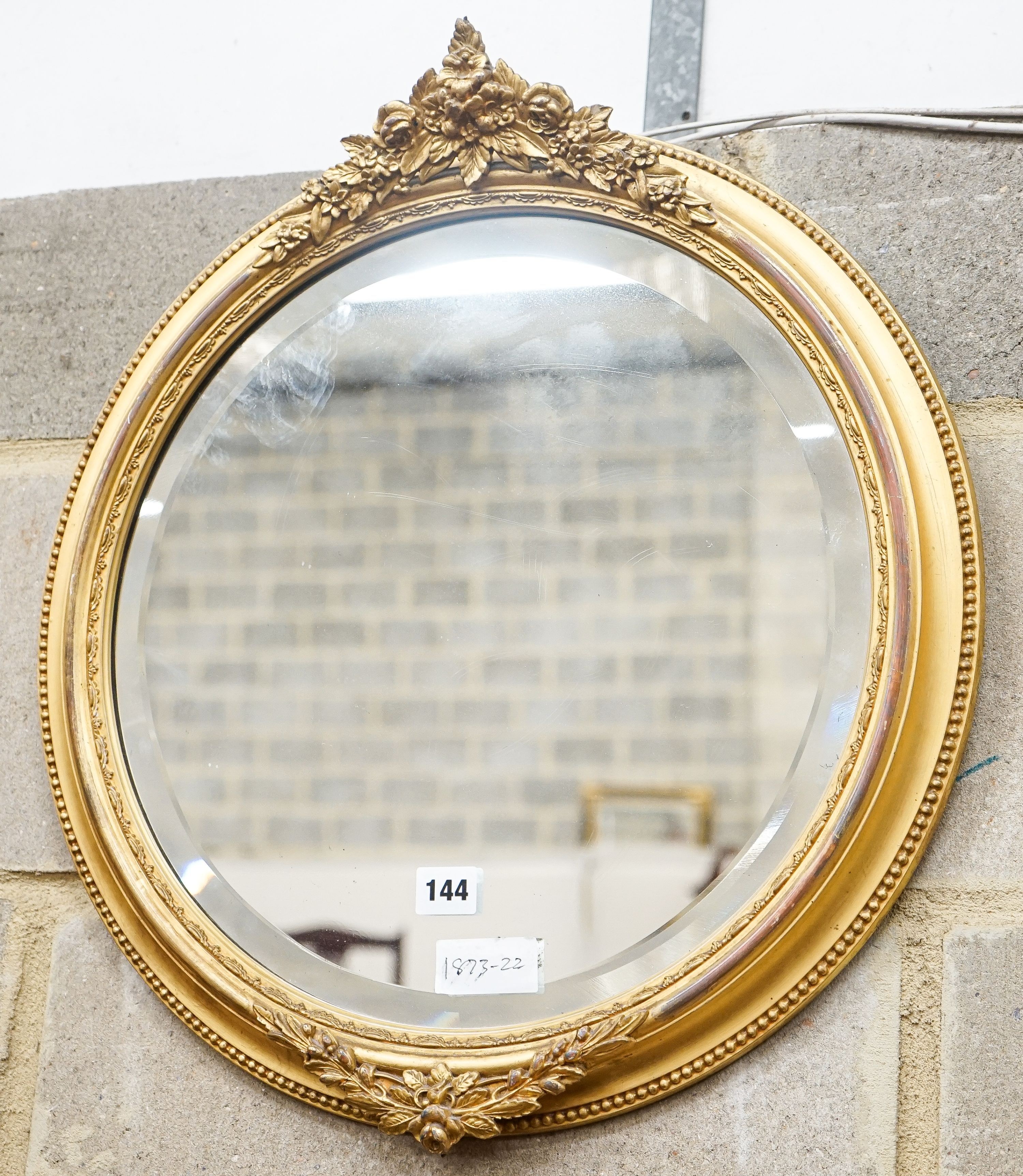 A Victorian circular gilt gesso wall mirror, diameter 48cm